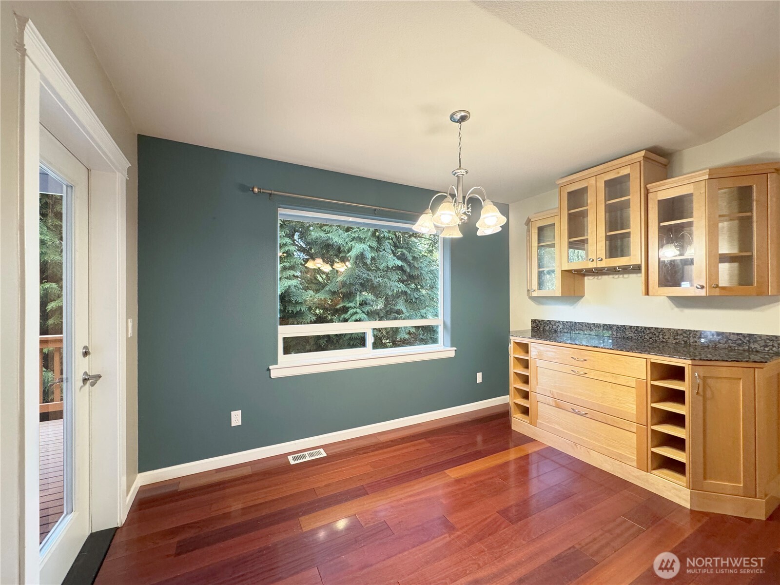 60 Alderwood Drive Sequim, WA 98382 - Photo 11 of 40 a view of an empty room with a window and wooden floor