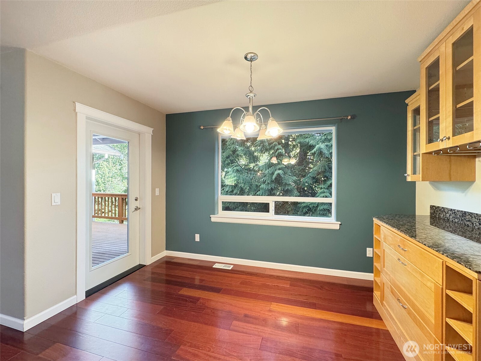 60 Alderwood Drive Sequim, WA 98382 - Photo 12 of 40 a view of an empty room with wooden floor and a window
