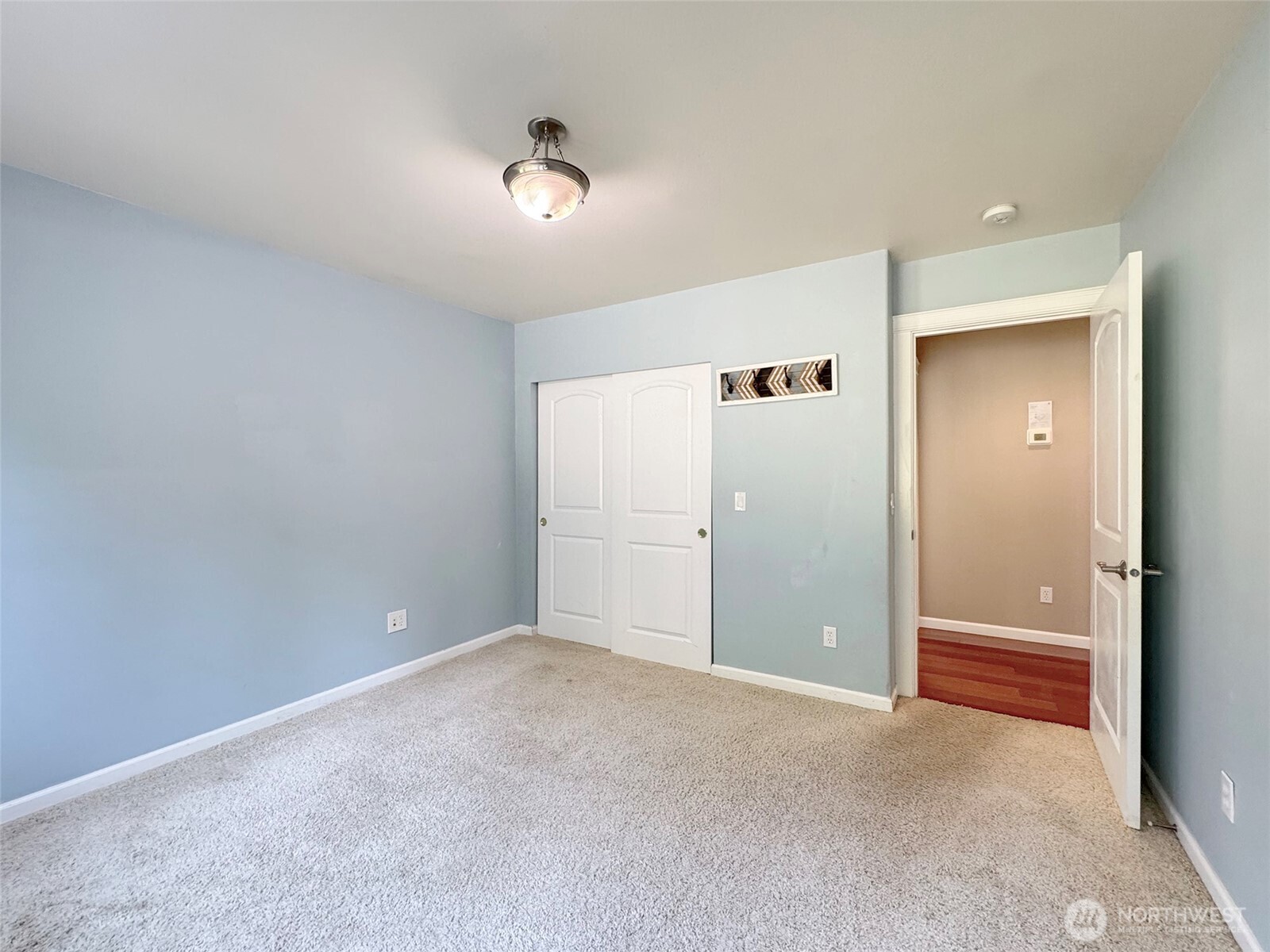 60 Alderwood Drive Sequim, WA 98382 - Photo 18 of 40 an empty room with closet and windows