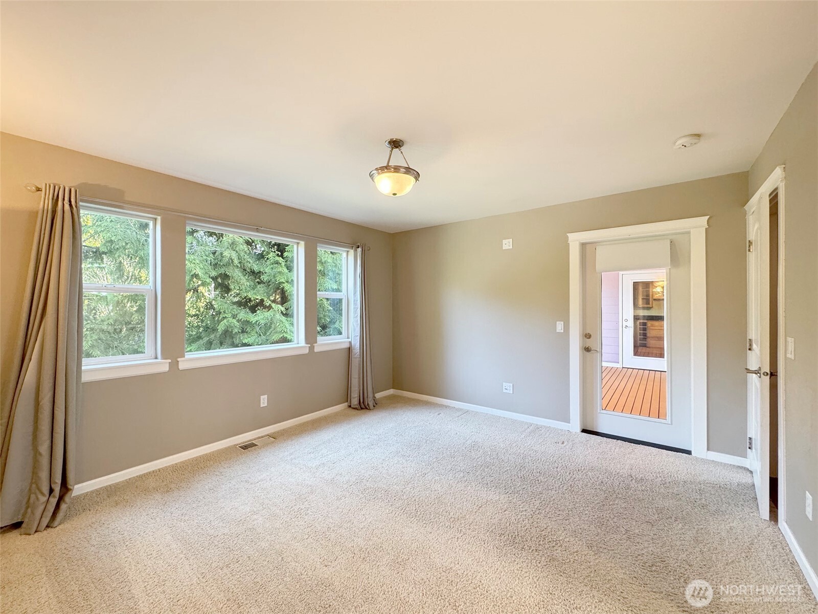 60 Alderwood Drive Sequim, WA 98382 - Photo 21 of 40 a view of an empty room with a window