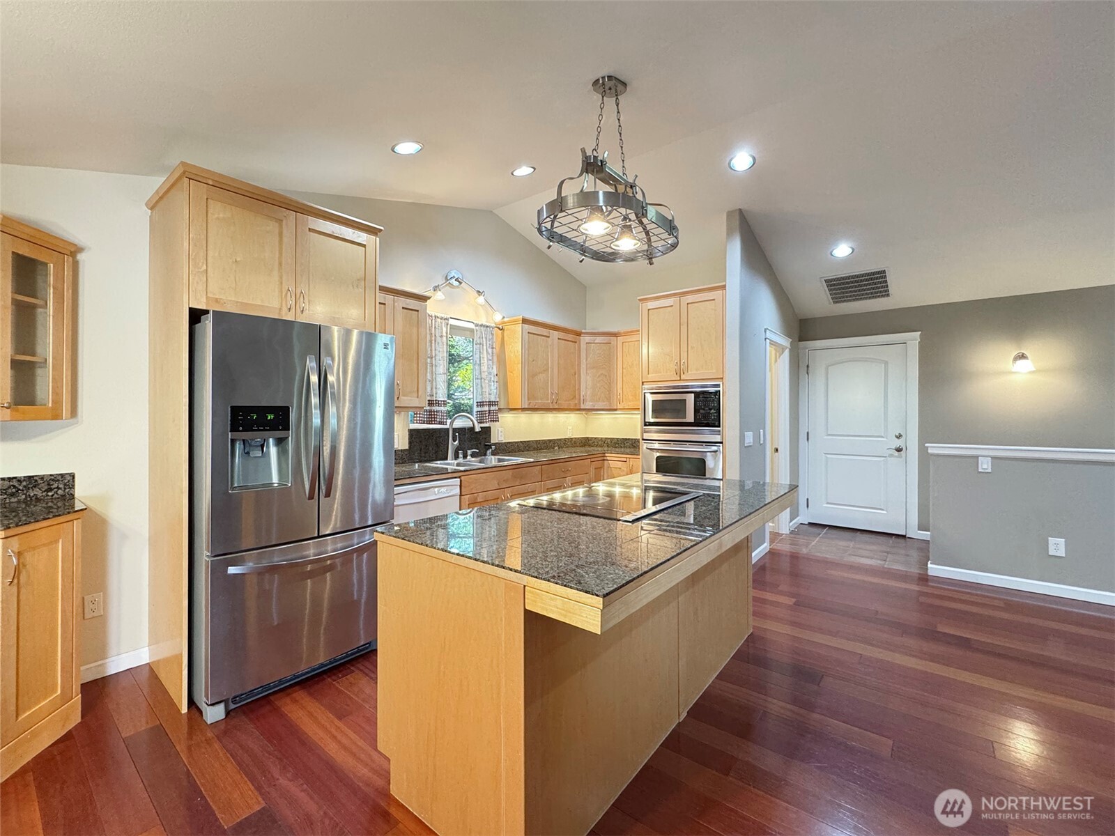 60 Alderwood Drive Sequim, WA 98382 - Photo 10 of 40 a large kitchen with stainless steel appliances granite countertop a refrigerator and a stove top oven