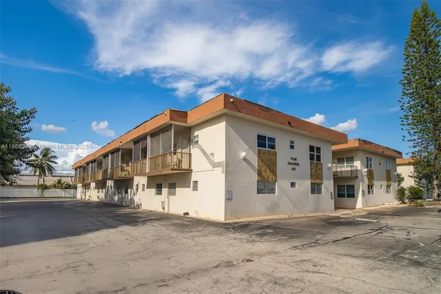 a view of a building with a street