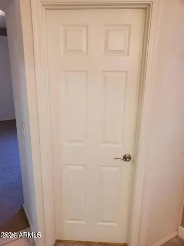 an empty room with a door