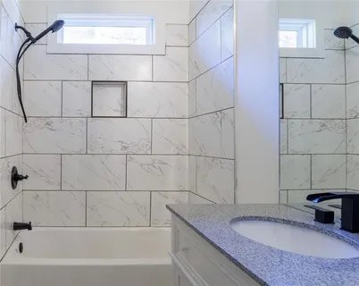 an empty room with a empty space and a window