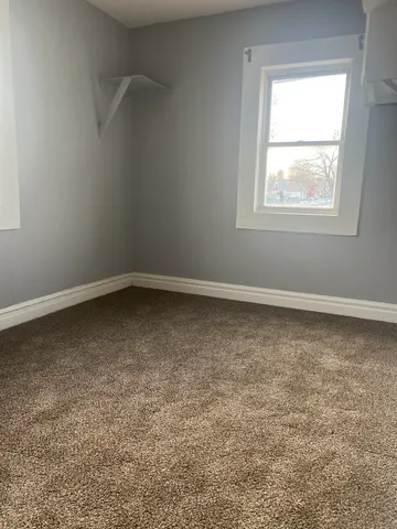 an empty room with a window