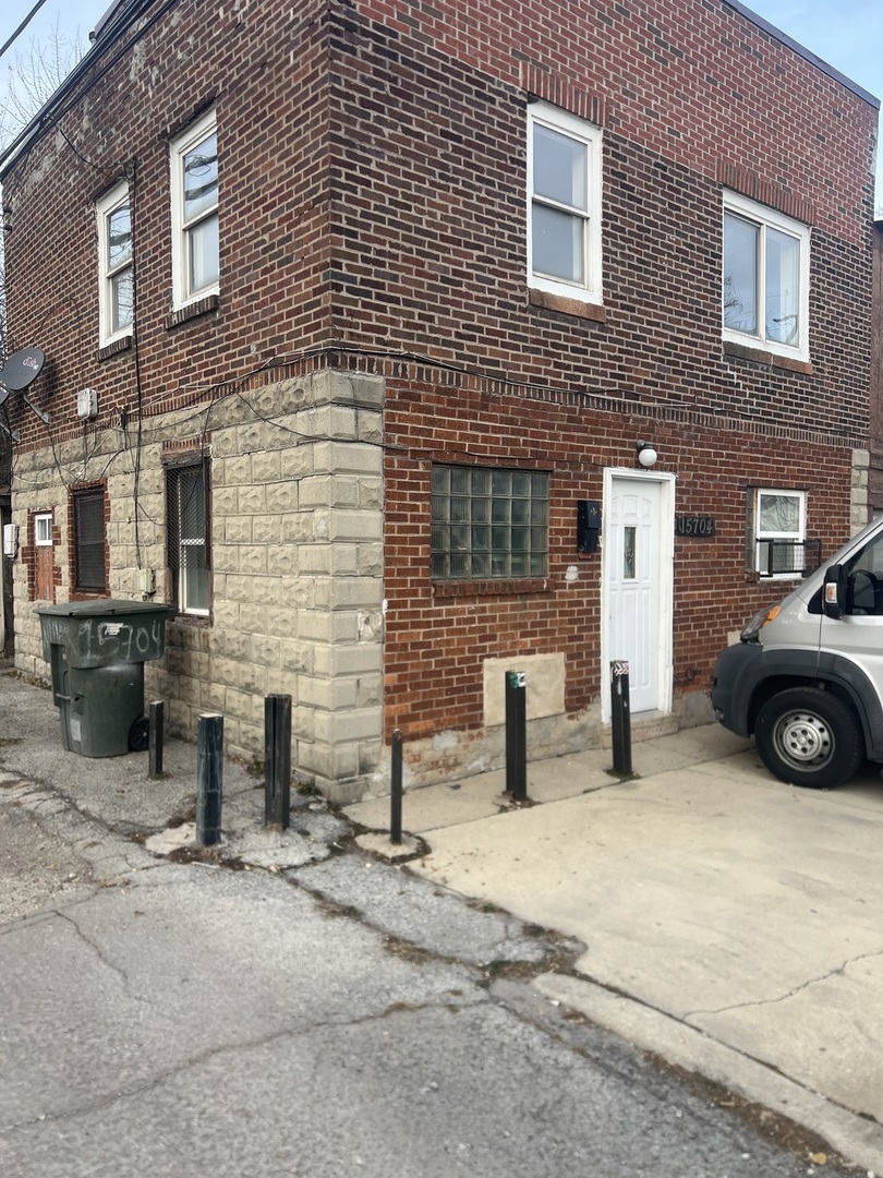 15704 Willard Avenue Harvey, IL 60426 - Photo 5 of 26 a view of a brick building with many windows
