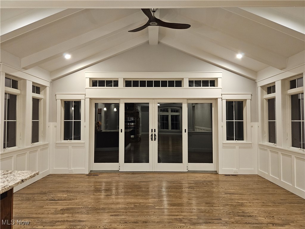6155 Beach Road Wadsworth, OH 44281 - Photo 13 of 49 Sunroom with vaulted ceiling with beams and ceiling fan, hardwood floors, sliding doors to patio and several windows