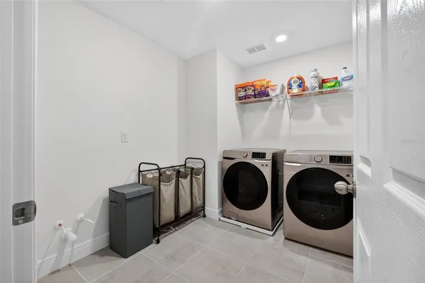 a bathroom with a shower and toilet