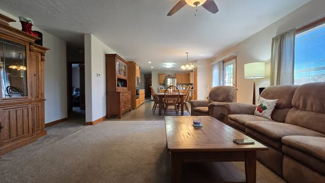 a kitchen with stainless steel appliances a sink stove and cabinets