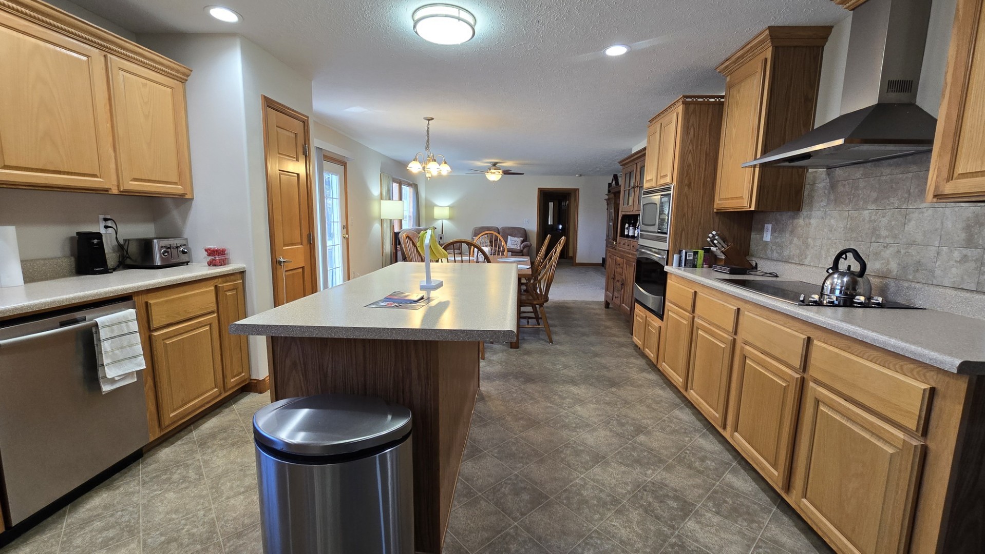 1240 Hummingbird Road Buncombe, IL 62912 - Photo 21 of 51 a kitchen with stainless steel appliances a sink stove and cabinets