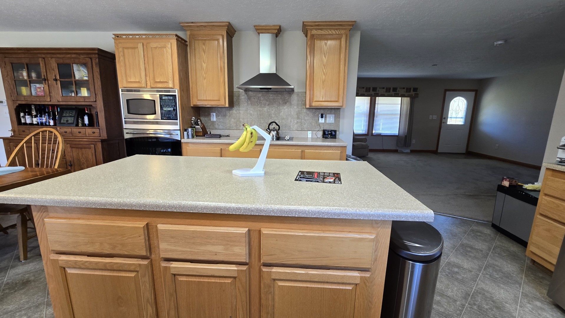 1240 Hummingbird Road Buncombe, IL 62912 - Photo 26 of 51 a view of a kitchen with kitchen island a counter top space appliances and a center island