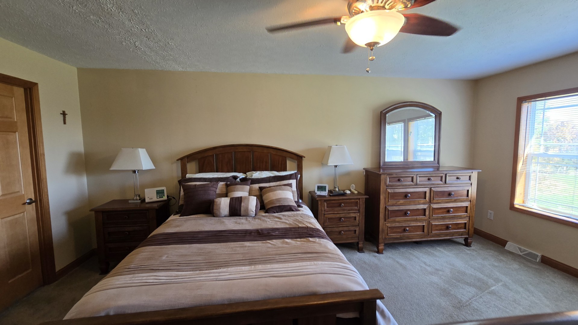 1240 Hummingbird Road Buncombe, IL 62912 - Photo 30 of 51 a bedroom with bed and a chandelier