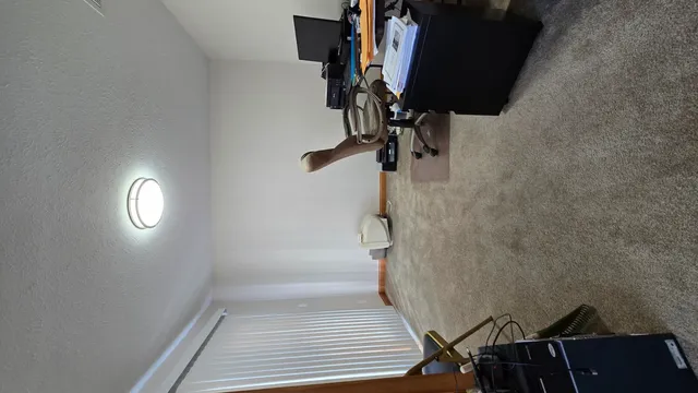 a view of an empty room and window