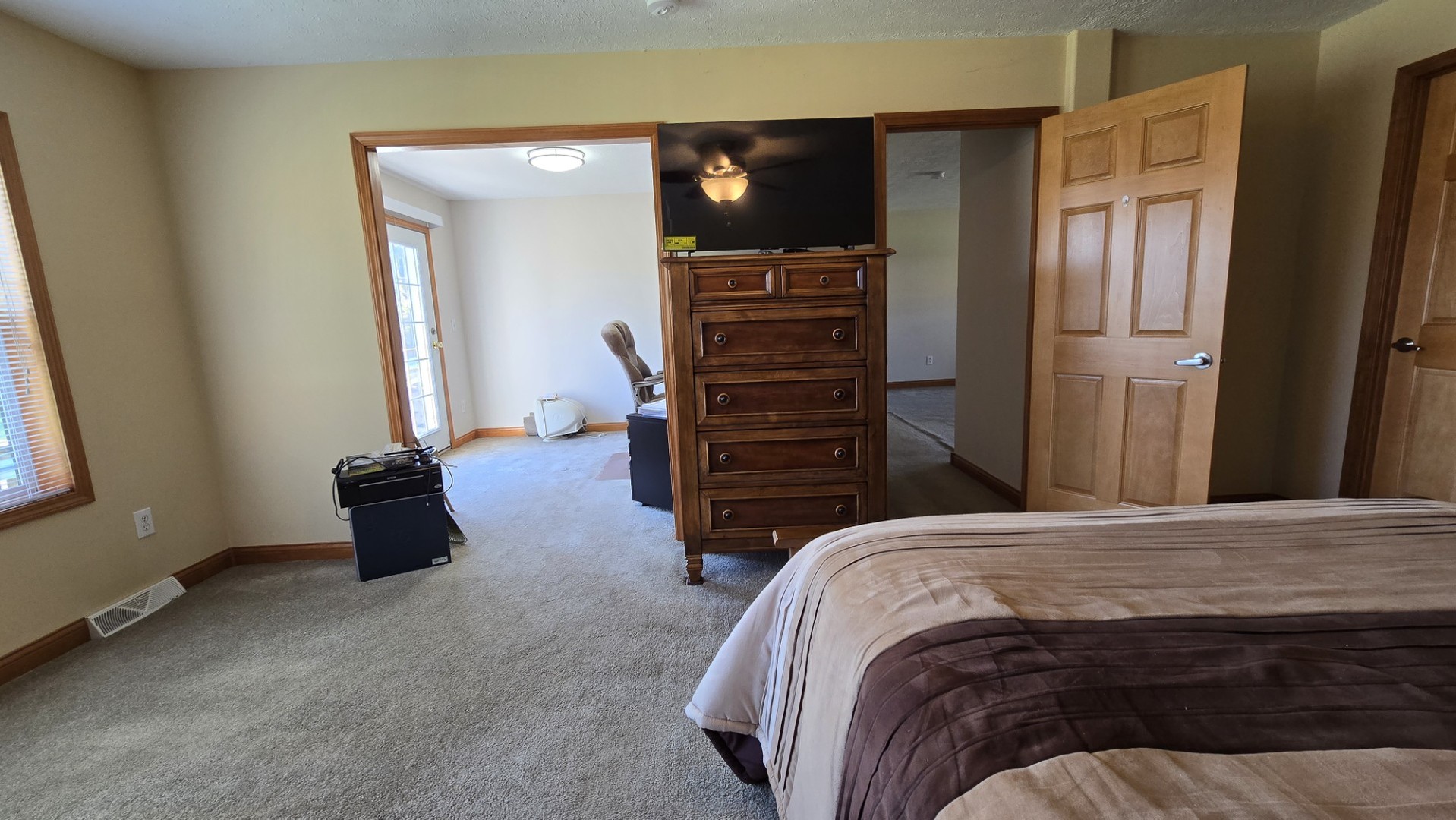 1240 Hummingbird Road Buncombe, IL 62912 - Photo 35 of 51 a bedroom with a bed and a television