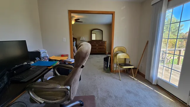 a bedroom with two beds and painted walls