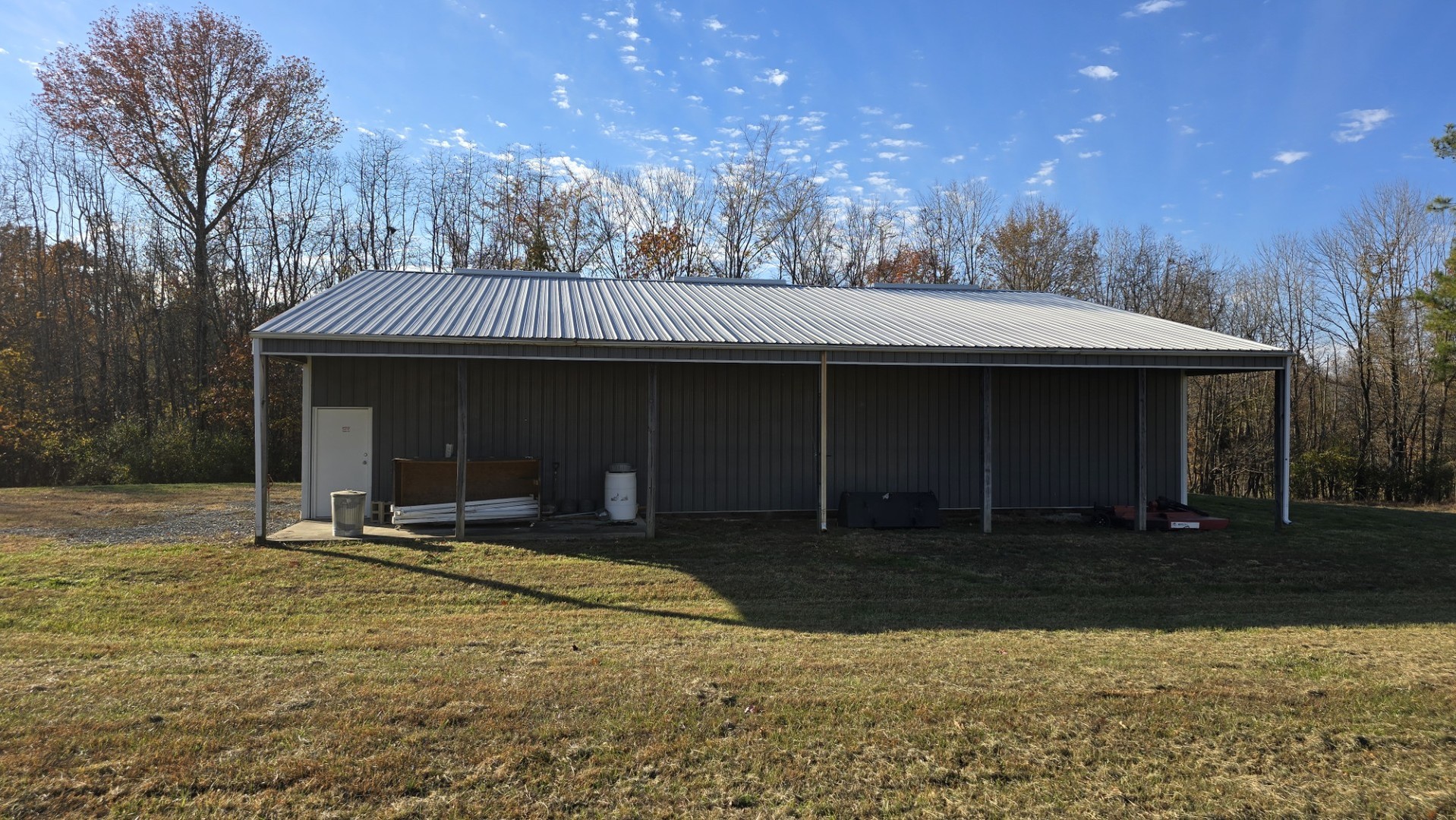 1240 Hummingbird Road Buncombe, IL 62912 - Photo 4 of 51 a front view of a house with garden