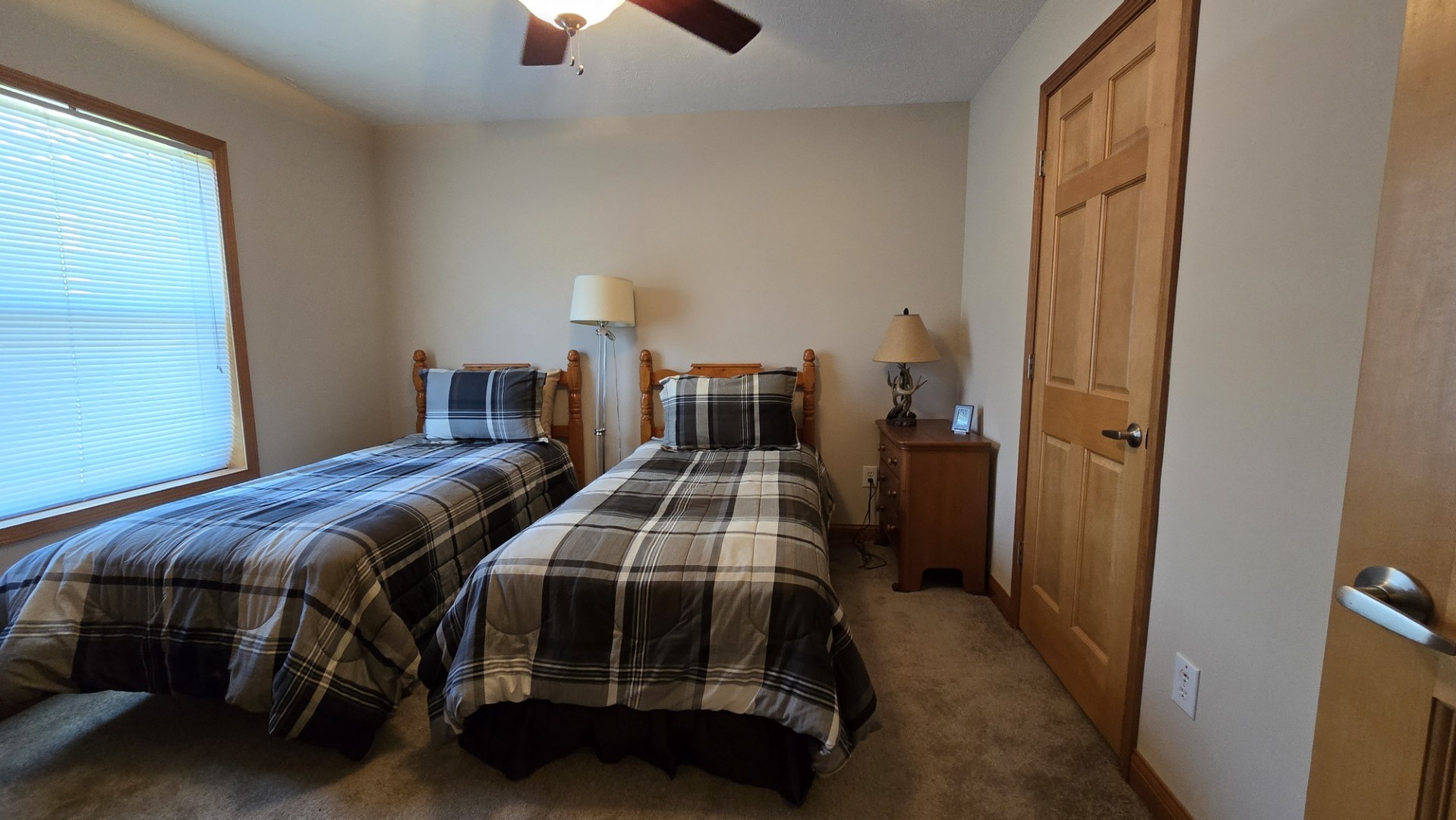 1240 Hummingbird Road Buncombe, IL 62912 - Photo 45 of 51 a bedroom with two beds and painted walls