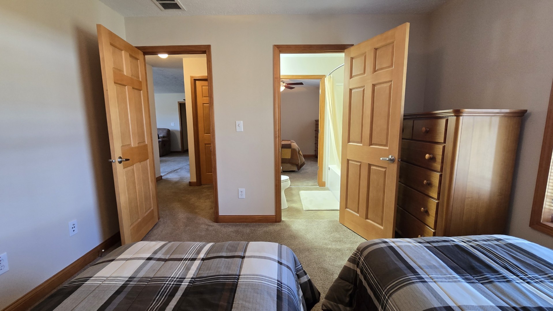 1240 Hummingbird Road Buncombe, IL 62912 - Photo 47 of 51 a bedroom with a bed and wooden floor