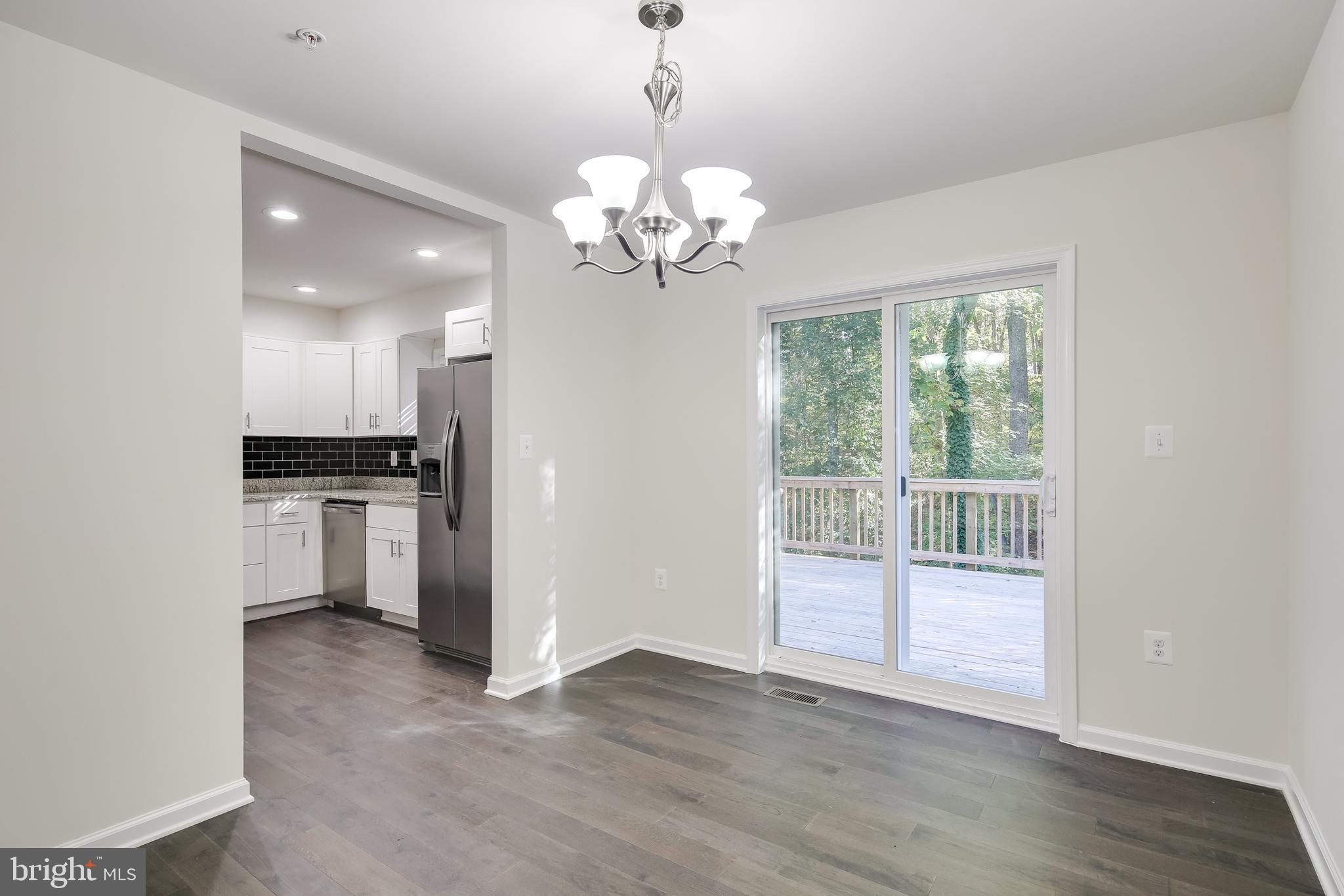 309 Lyric Lane Silver Spring, MD 20901 - Photo 8 of 26 Dining Room w/Walk out to Deck