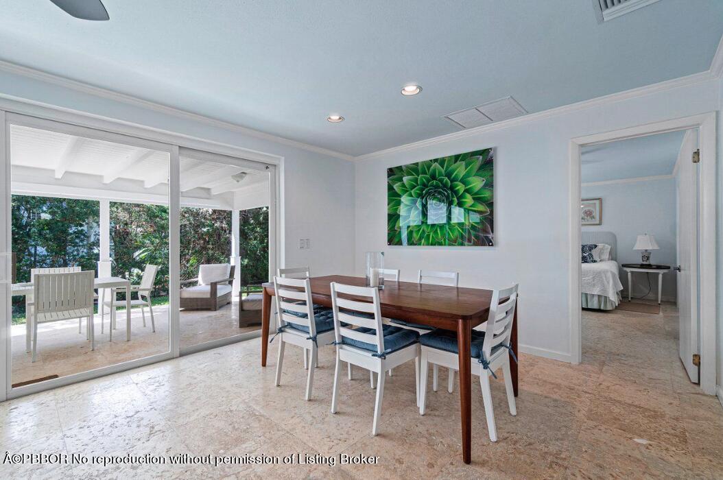 110 Seagate Road Palm Beach, FL 33480 - Photo 9 of 19 a view of a dining room with furniture window and outside view