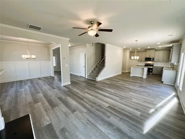 a view of a kitchen with a sink and dishwasher