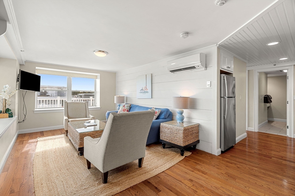 175 Bridge Road Salisbury, MA 01952 - Photo 11 of 42 a living room with furniture and a table