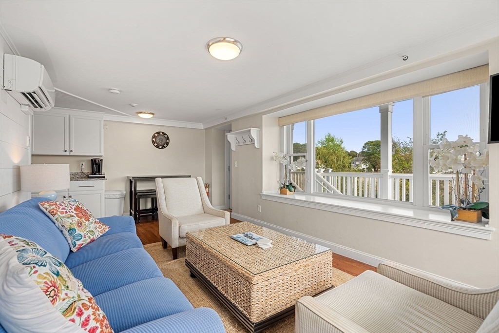 175 Bridge Road Salisbury, MA 01952 - Photo 18 of 42 a living room with furniture and a large window