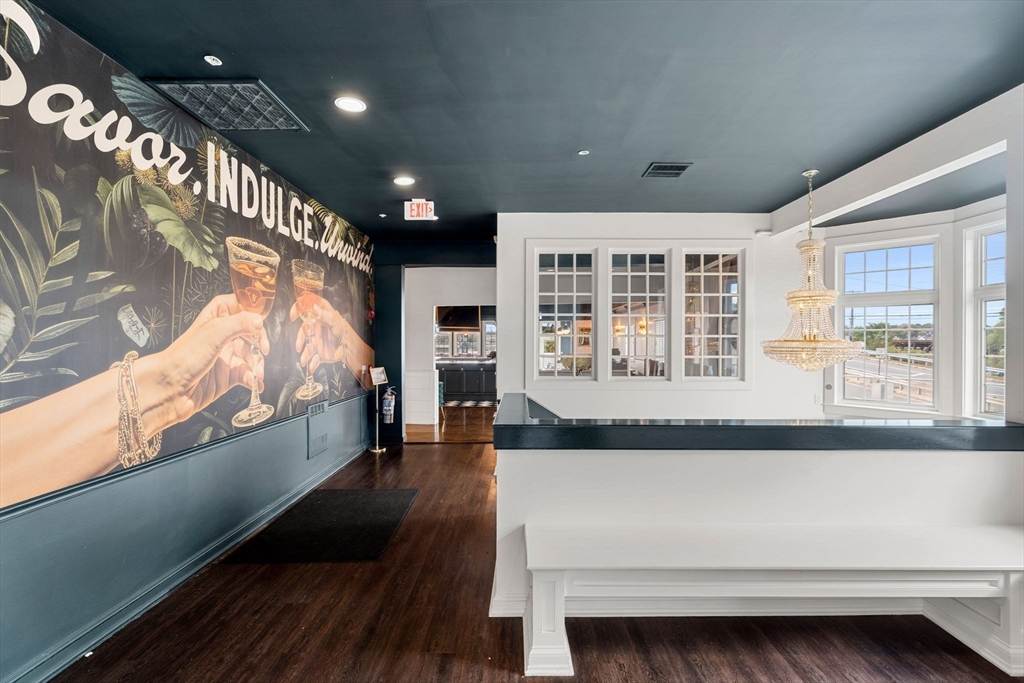 175 Bridge Road Salisbury, MA 01952 - Photo 28 of 42 a living room with a large window