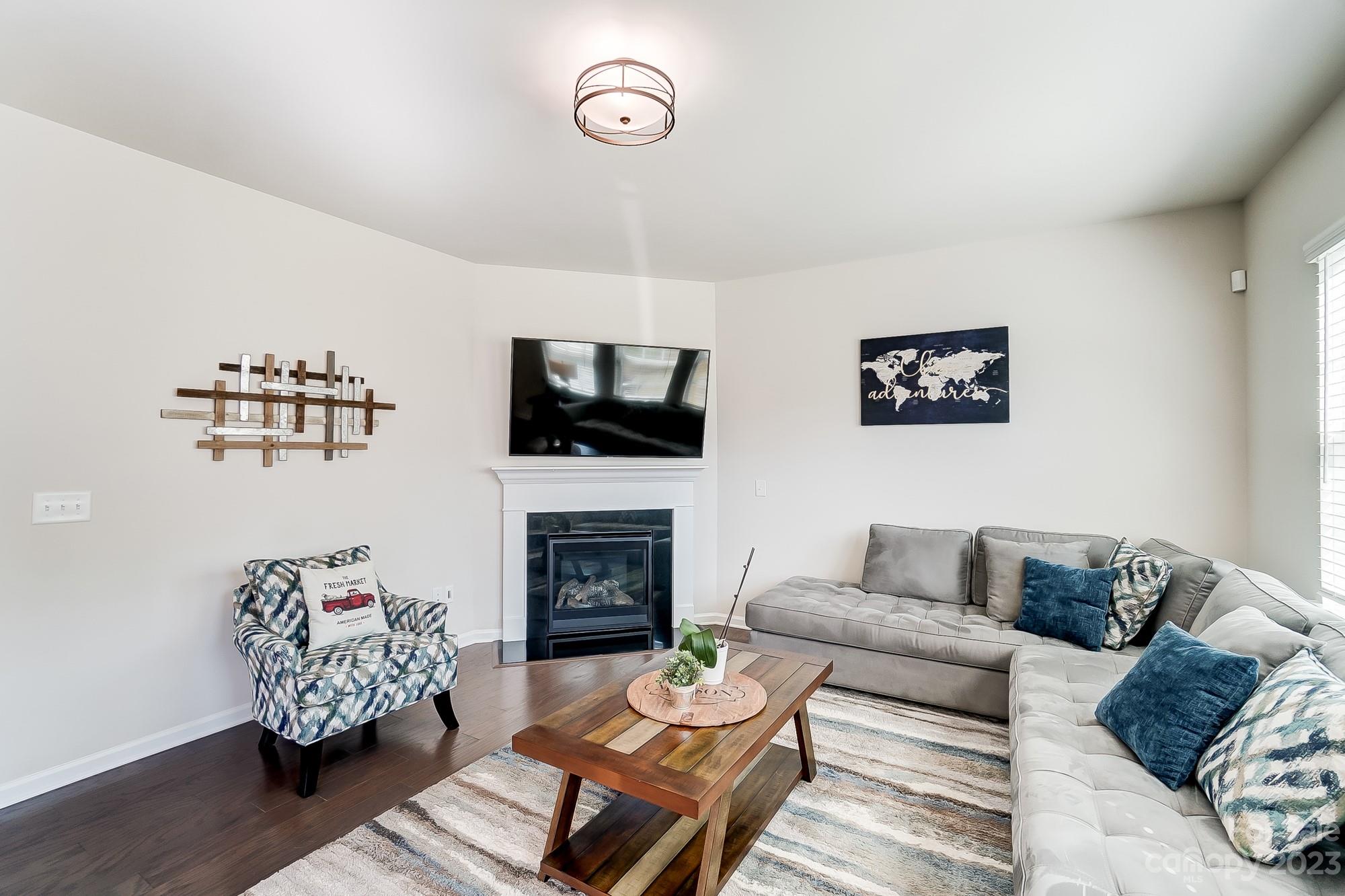 1712 Loggerhead Drive Lancaster, SC 29720 - Photo 5 of 43 a living room with furniture and a fireplace