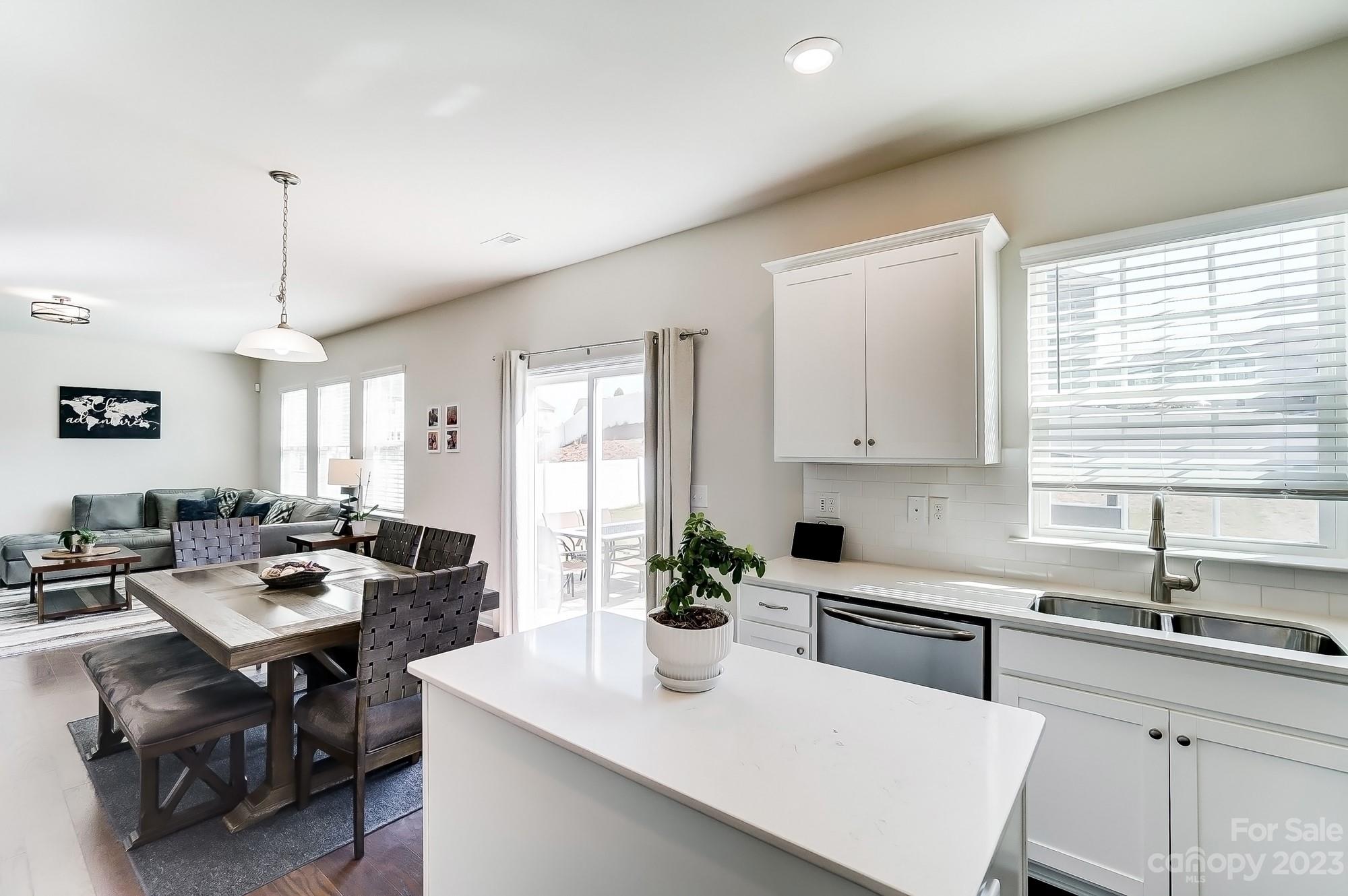 1712 Loggerhead Drive Lancaster, SC 29720 - Photo 10 of 43 a kitchen with a sink a stove a refrigerator and cabinets