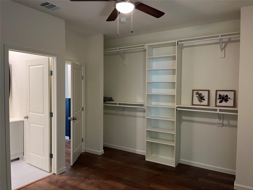 315 Hobson Street Weatherford, TX 76086 - Photo 15 of 24 a room with a hardwood floor and ceiling fan