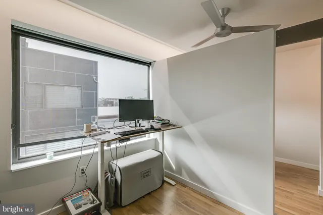 a kitchen with stainless steel appliances a stove and a refrigerator