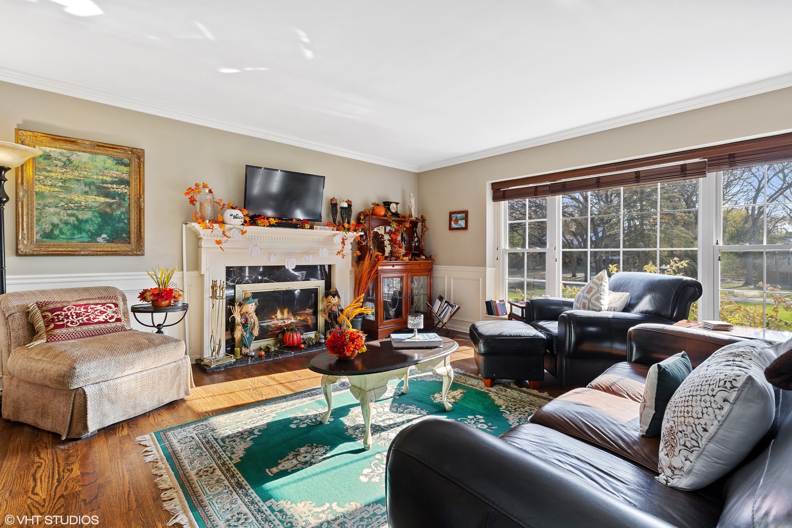 20 Marryat Road Trout Valley, IL 60013 - Photo 3 of 33 a living room with furniture a flat screen tv and a fireplace