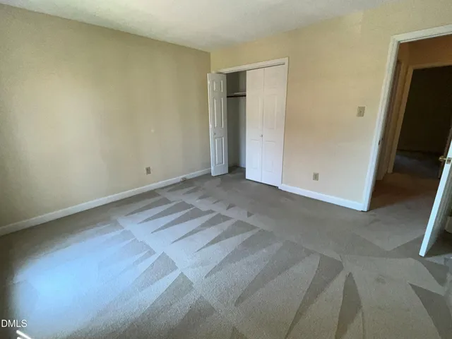 a view of room with walk in closet