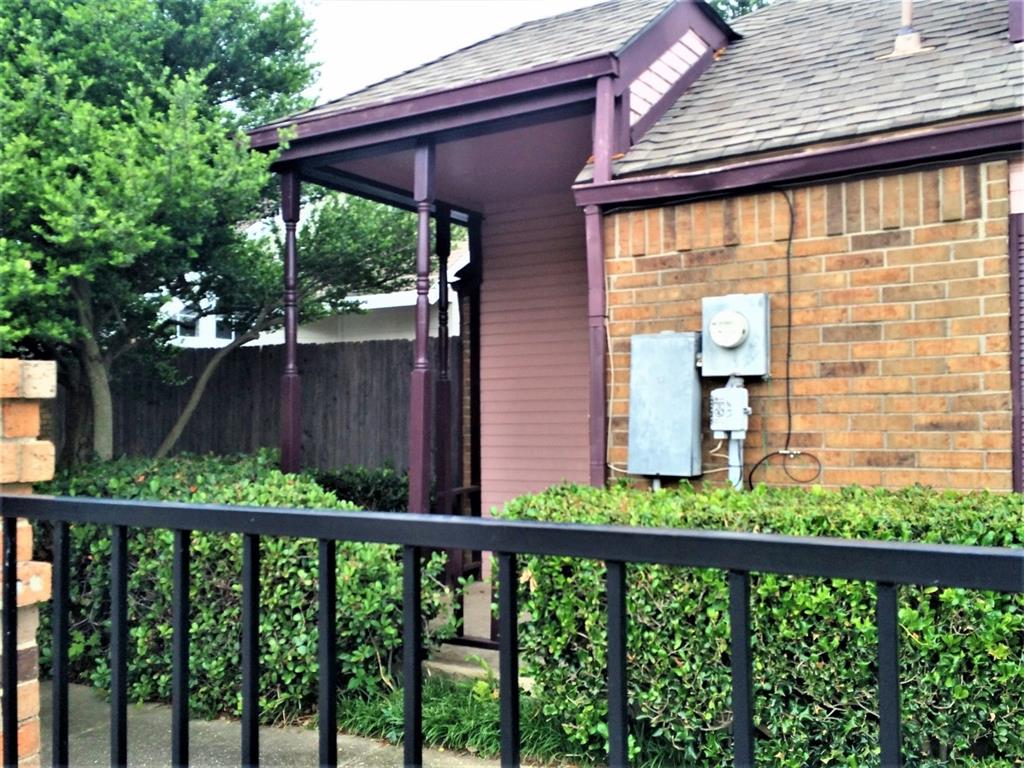 3147 Royal Gable Drive Dallas, TX 75229 - Photo 2 of 22 a view of a balcony with wooden floor