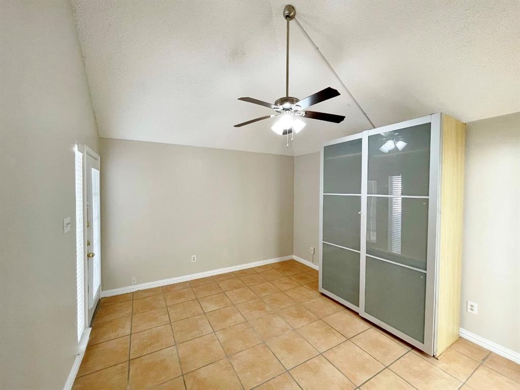 3147 Royal Gable Drive Dallas, TX 75229 - Photo 10 of 22 a view of a room with a ceiling fan and entryway
