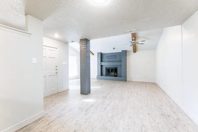 a kitchen with granite countertop a sink and granite counter tops