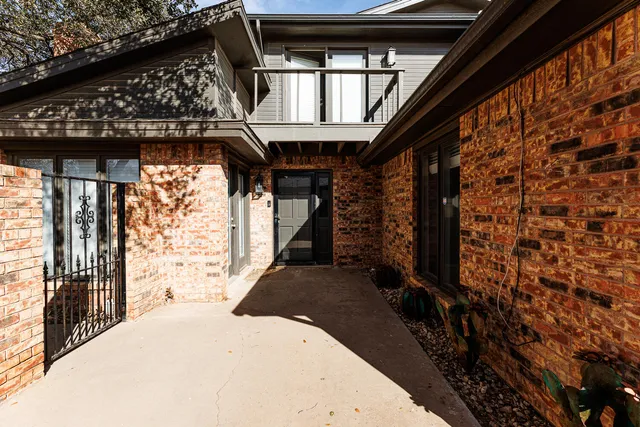 a front view of a house with a garage