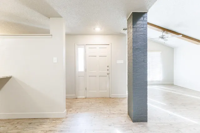 a view of a livingroom with a fireplace