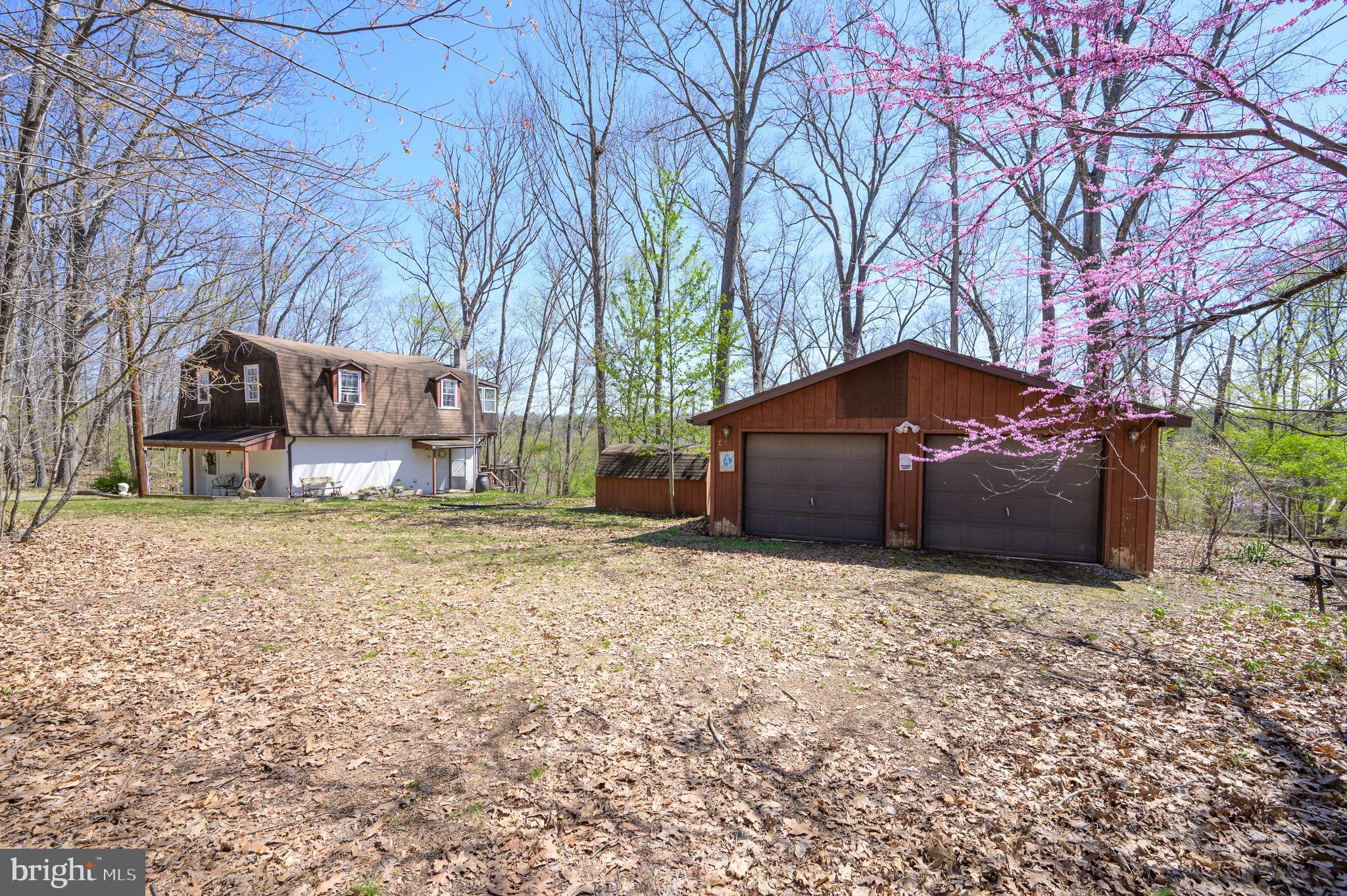 1524 Lamplight Road Bunker Hill, WV 25413 - Photo 25 of 44 a house view with a outdoor space