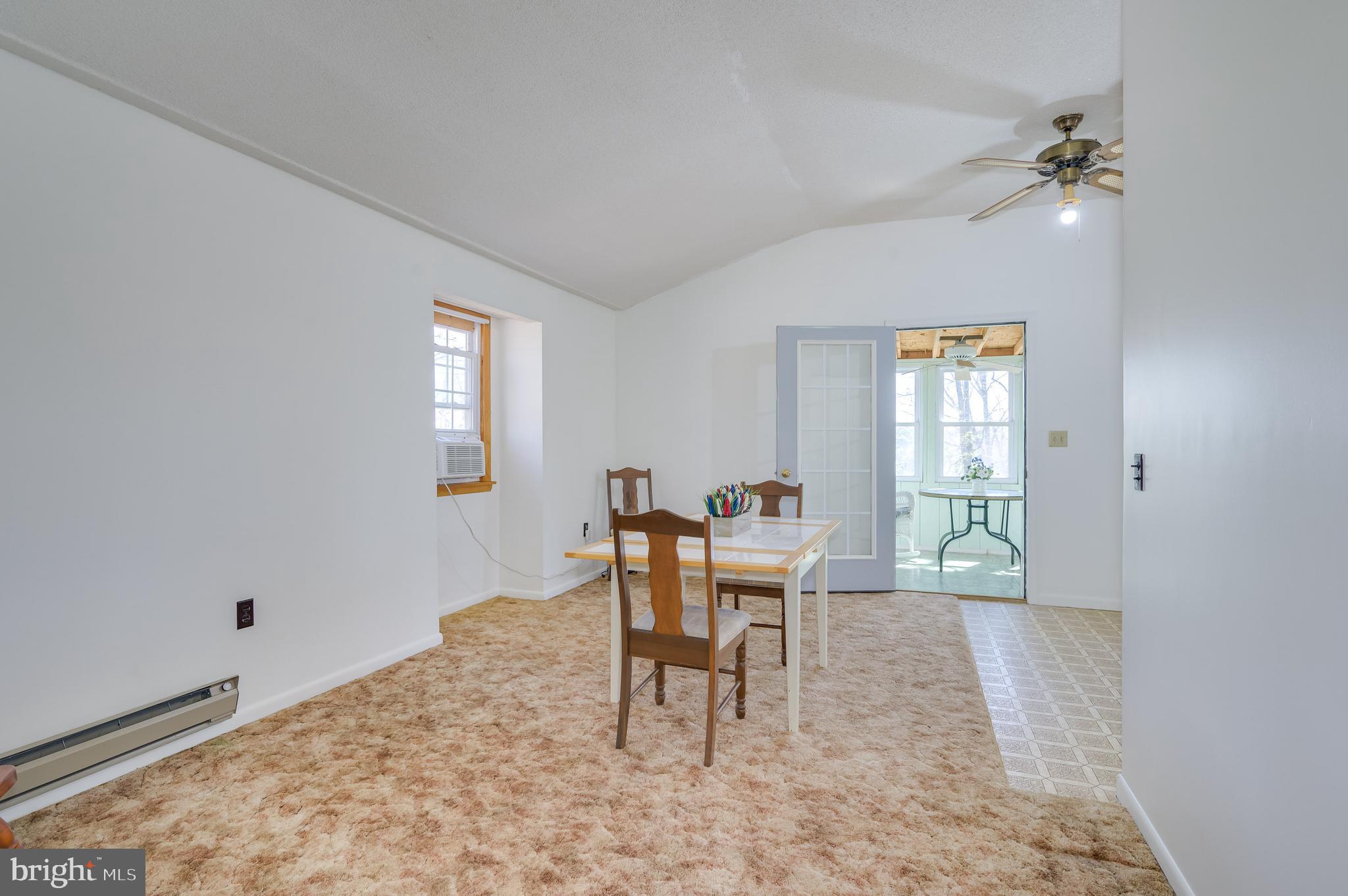 1524 Lamplight Road Bunker Hill, WV 25413 - Photo 10 of 44 a living room with furniture and a window