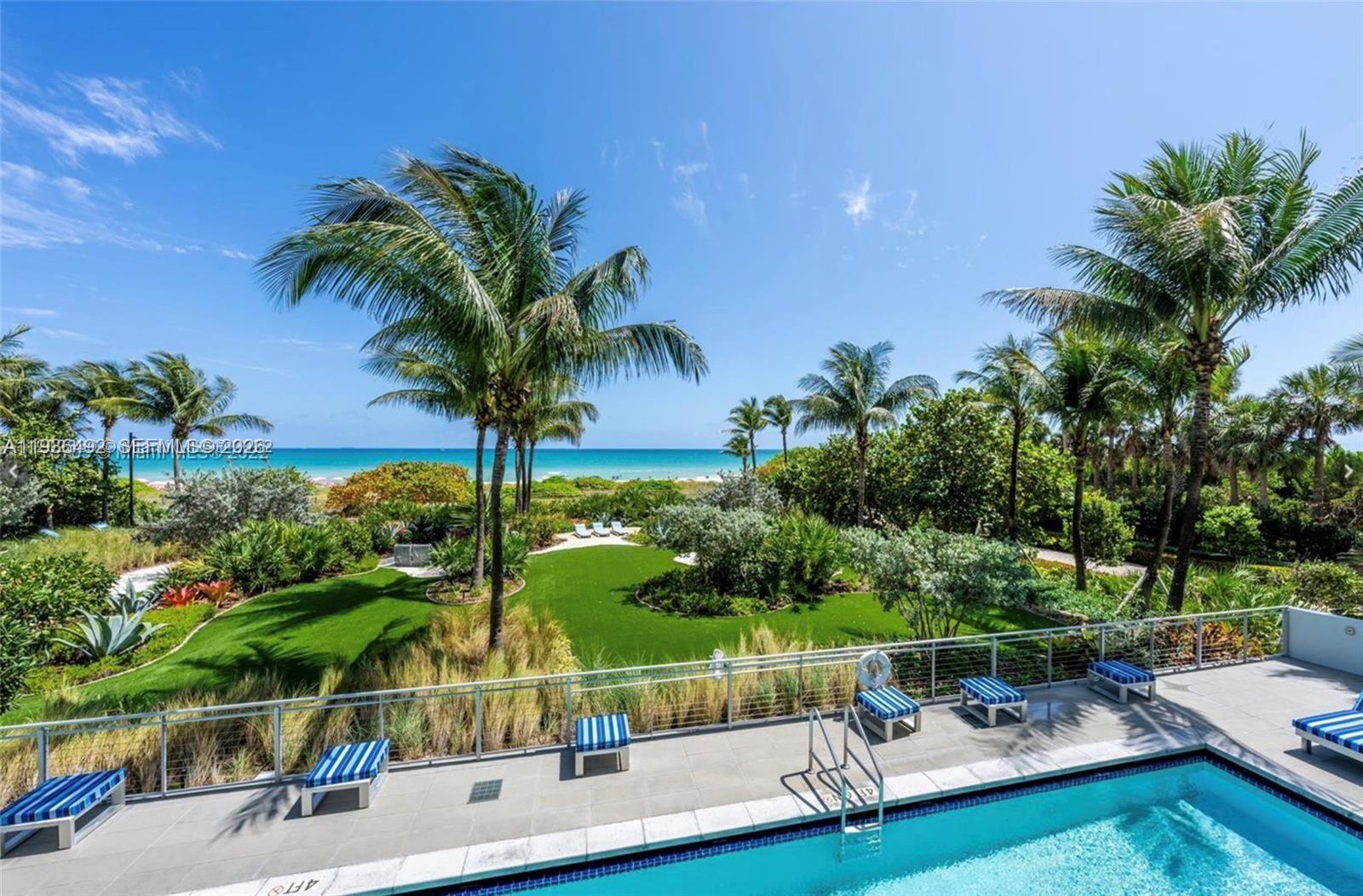 9401 Collins Avenue, Unit 206 Surfside, FL 33154 - Photo 20 of 21 a view of a swimming pool with a patio