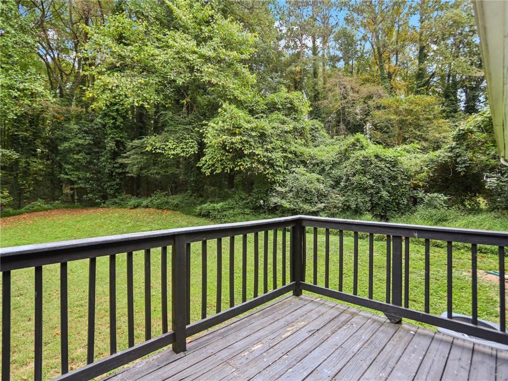 1918 West Kimberly Road Southwest Atlanta, GA 30331 - Photo 20 of 23 a view of balcony with wooden floor