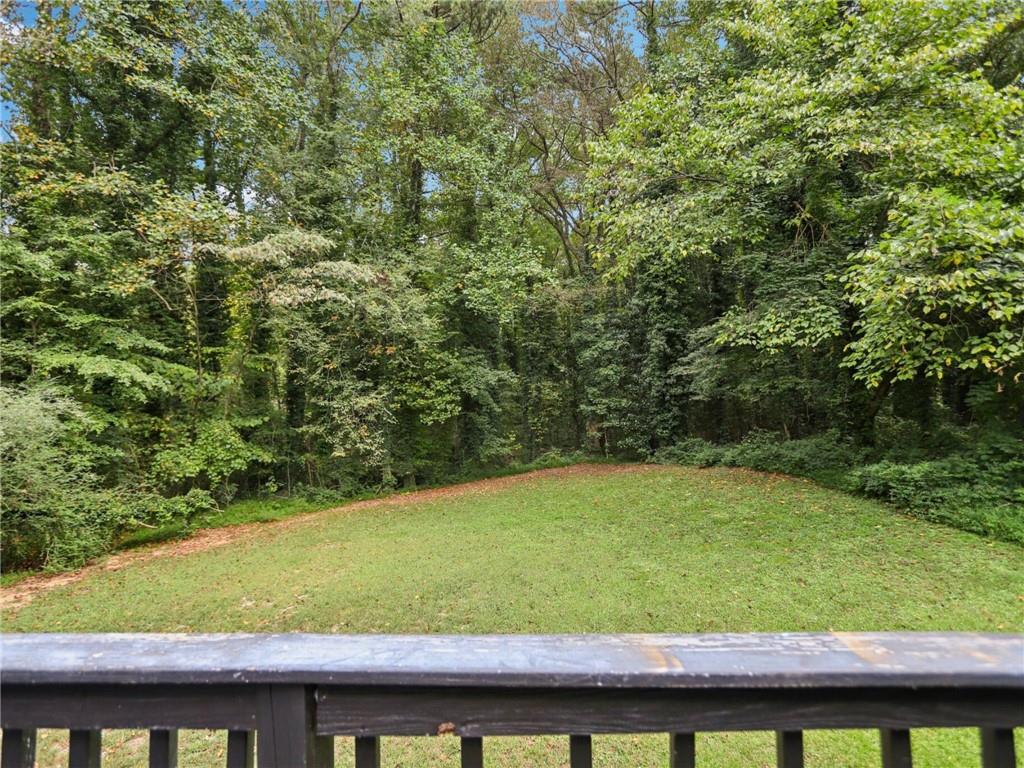 1918 West Kimberly Road Southwest Atlanta, GA 30331 - Photo 21 of 23 a view of a yard with a wooden fence