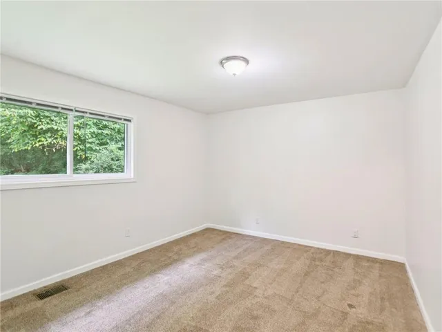 an empty room with a window