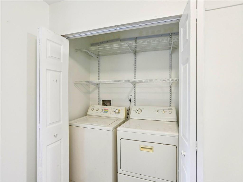 1918 West Kimberly Road Southwest Atlanta, GA 30331 - Photo 10 of 23 a utility room with dryer and washer