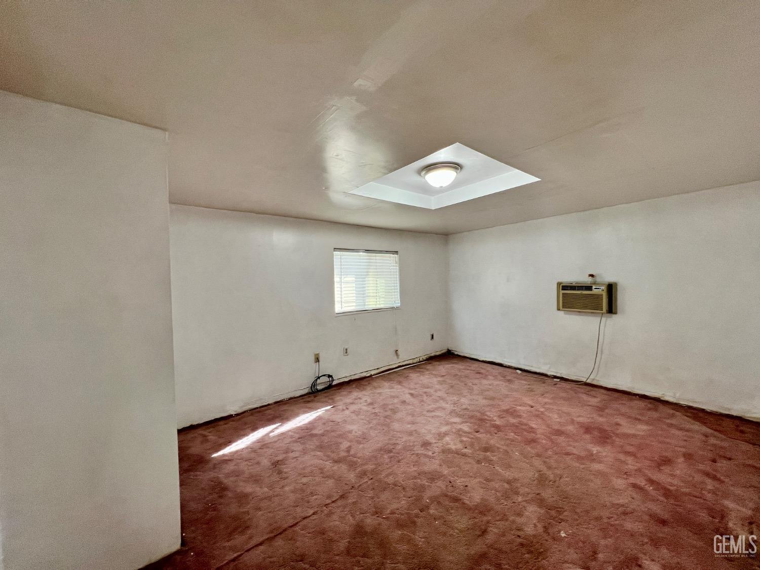 Undisclosed Address Wasco, CA 93280 - Photo 18 of 24 an empty room with windows