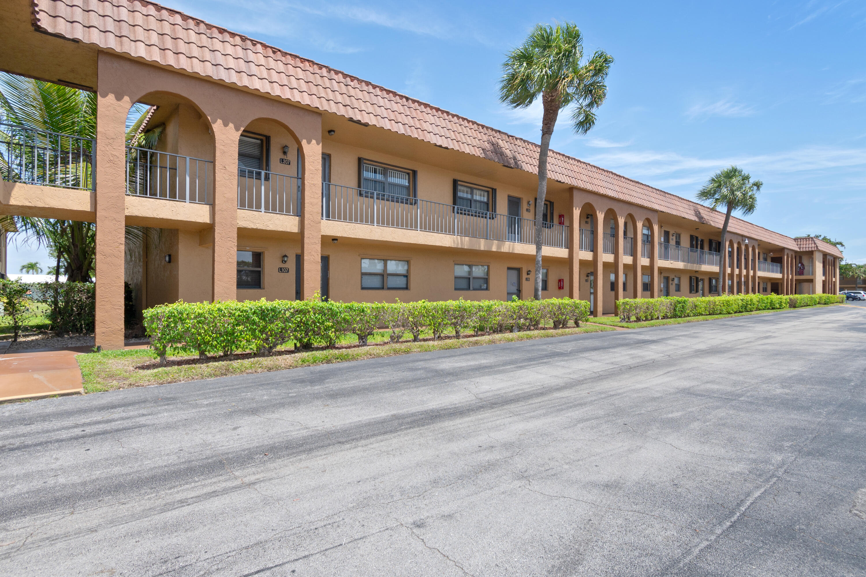2141 Woolbright Road, Unit L207 Boynton Beach, FL 33426 - Photo 1 of 15 Front Bldg