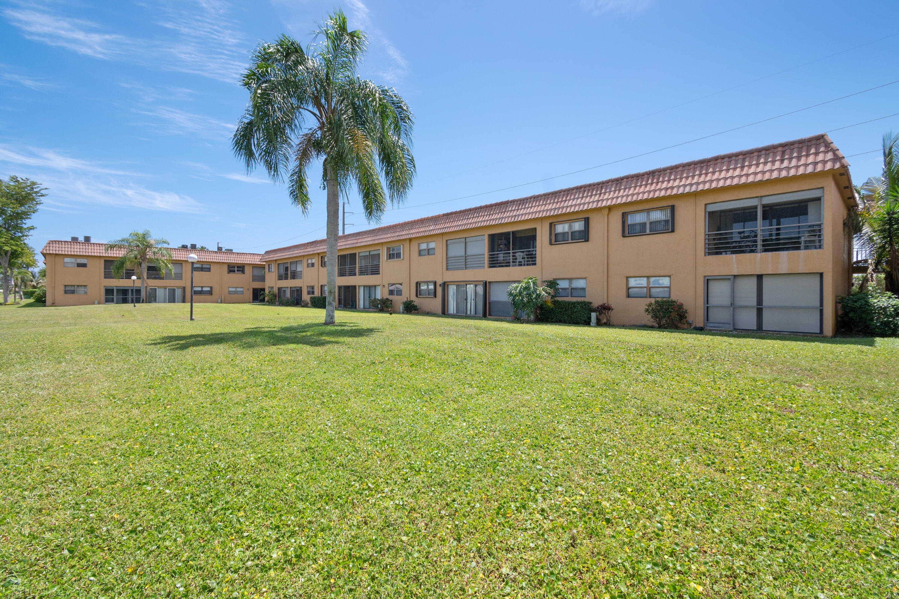 2141 Woolbright Road, Unit L207 Boynton Beach, FL 33426 - Photo 2 of 15 Back Bldg