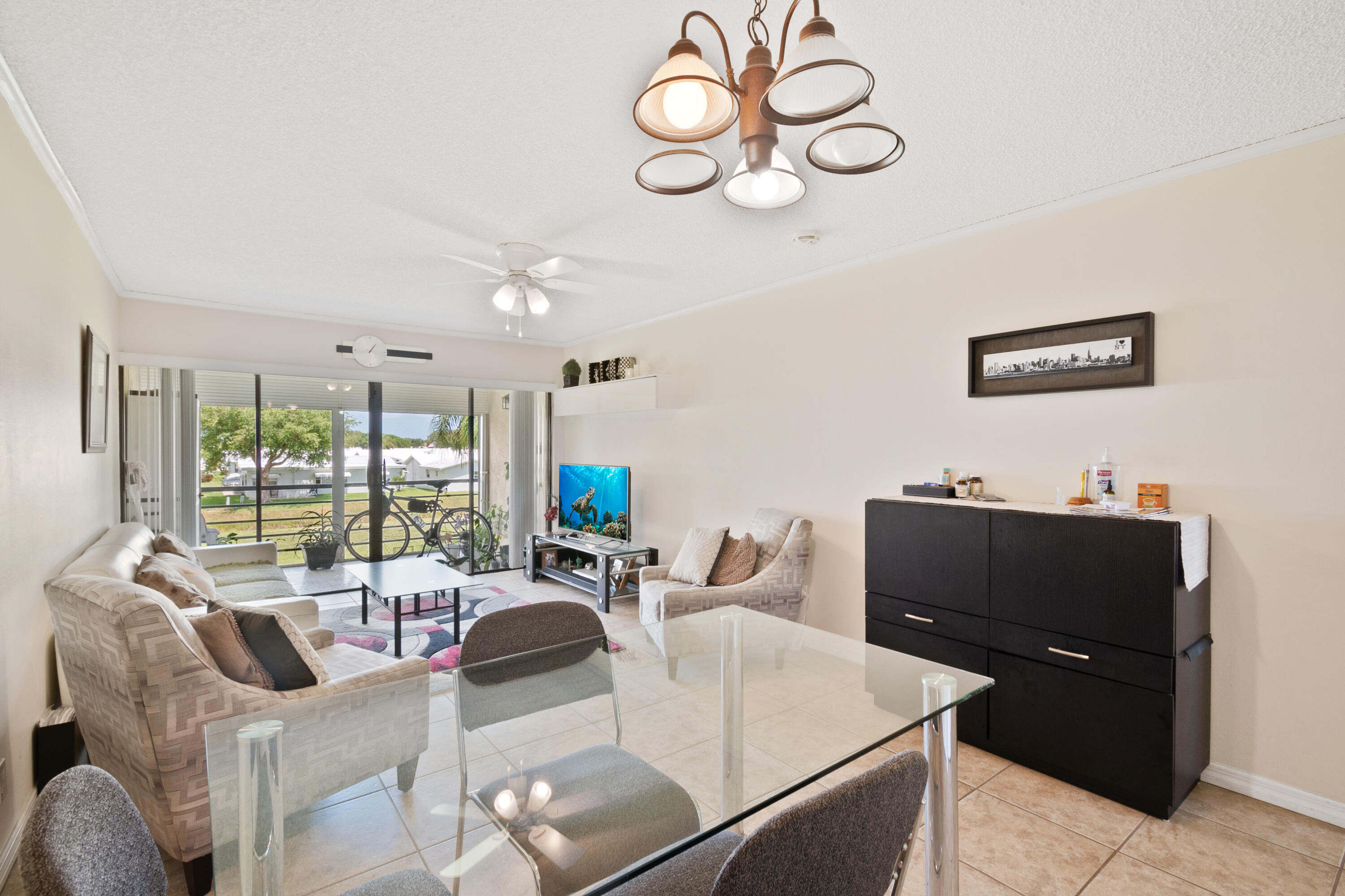 2141 Woolbright Road, Unit L207 Boynton Beach, FL 33426 - Photo 5 of 15 dining and family rm
